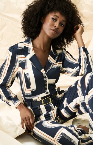 K-Design jumpsuit met design en riem FW25